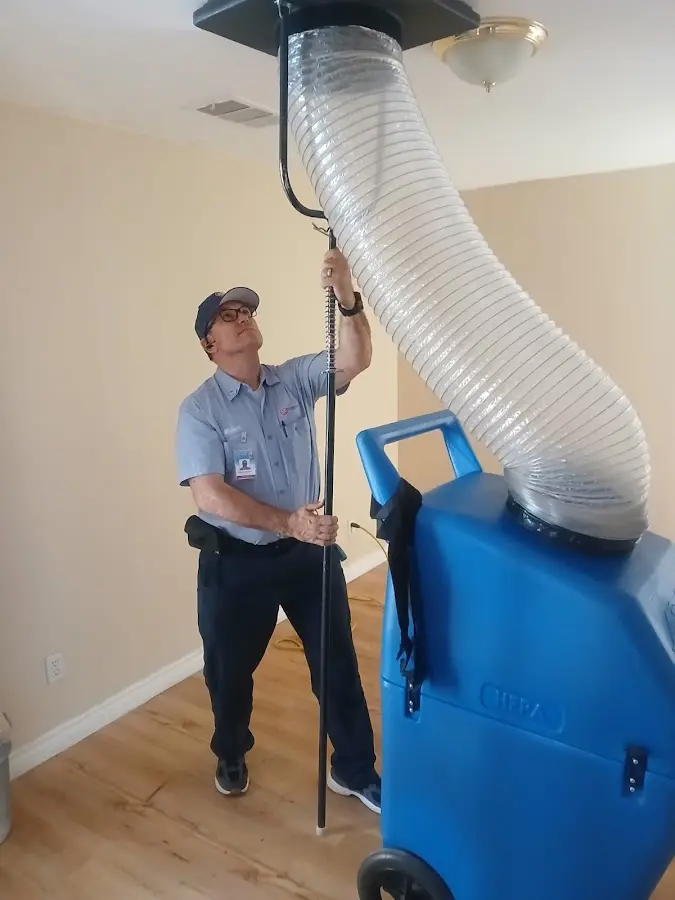 HVAC Installation technician using HEPA equipment in Benson